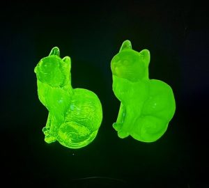 Uranium glass glowing under UV light