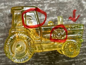 Location of Boyd marks on Tractor figurine